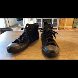 Black hightop sneakers